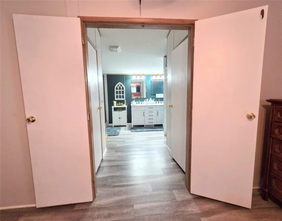 105 Eagle Pointe Estates New Eagle, PA 15067 - Photo 22 of 39 a view of a hallway with wooden floor