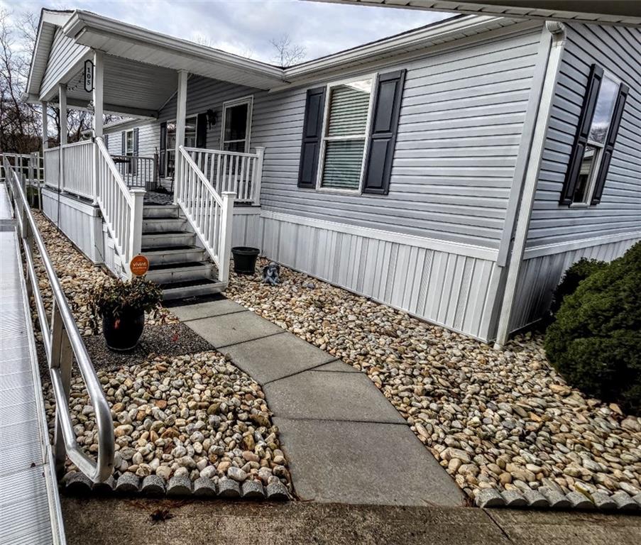 105 Eagle Pointe Estates New Eagle, PA 15067 - Photo 4 of 39 a view of a couches with wooden floor and fence
