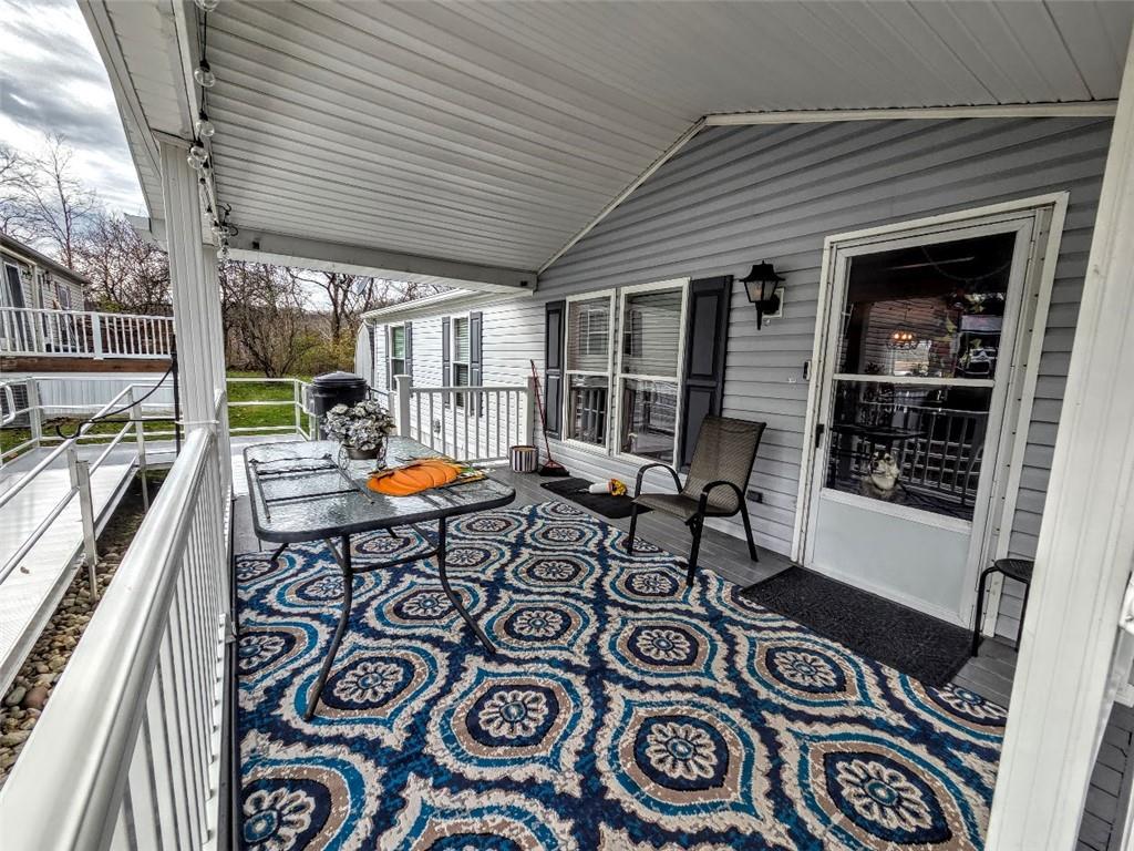 105 Eagle Pointe Estates New Eagle, PA 15067 - Photo 5 of 39 an outdoor living with furniture and garden view