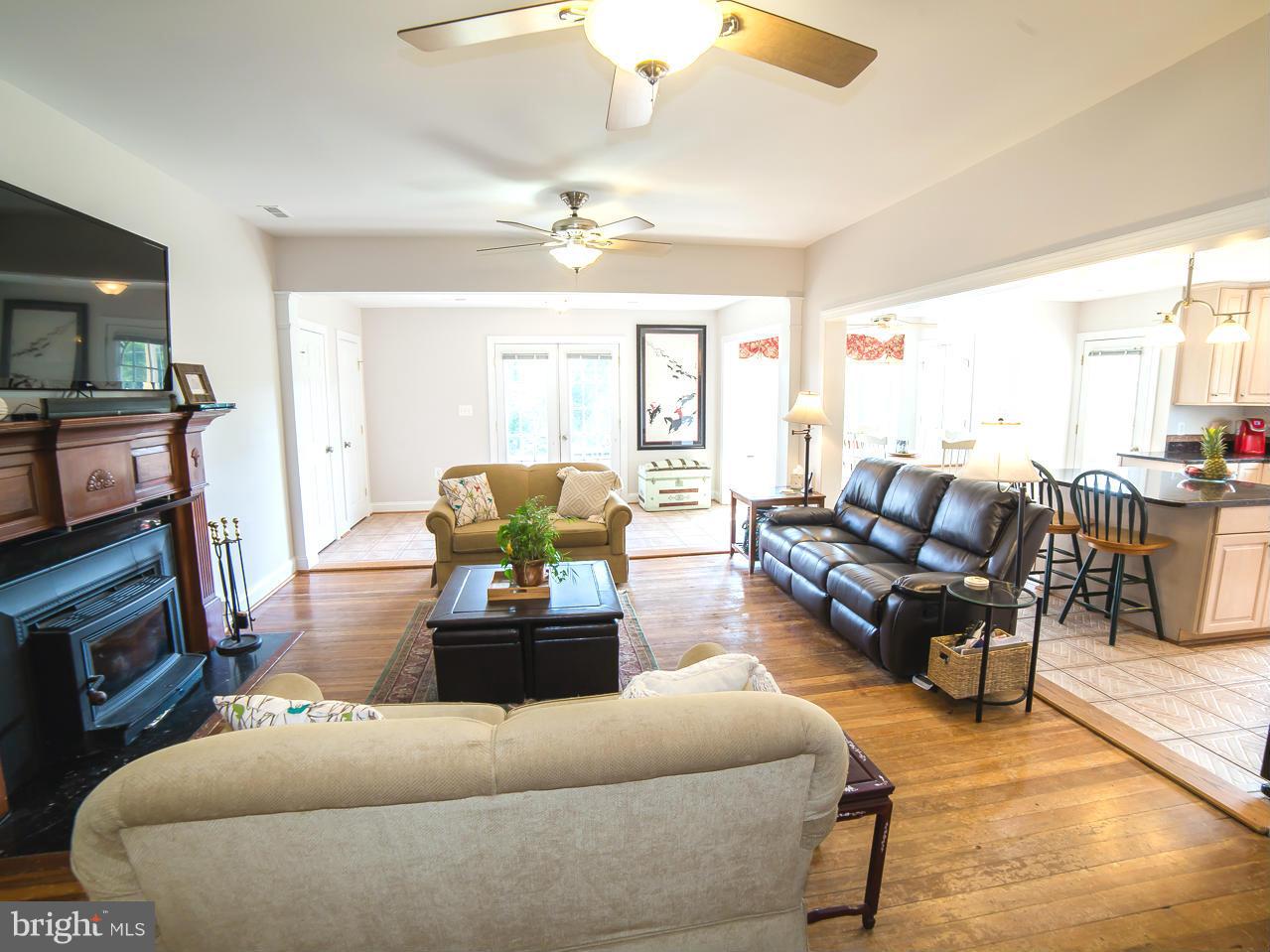 10383 Cliff Mills Road Marshall, VA 20115 - Photo 11 of 30 Family Room w/stove next to kitchen