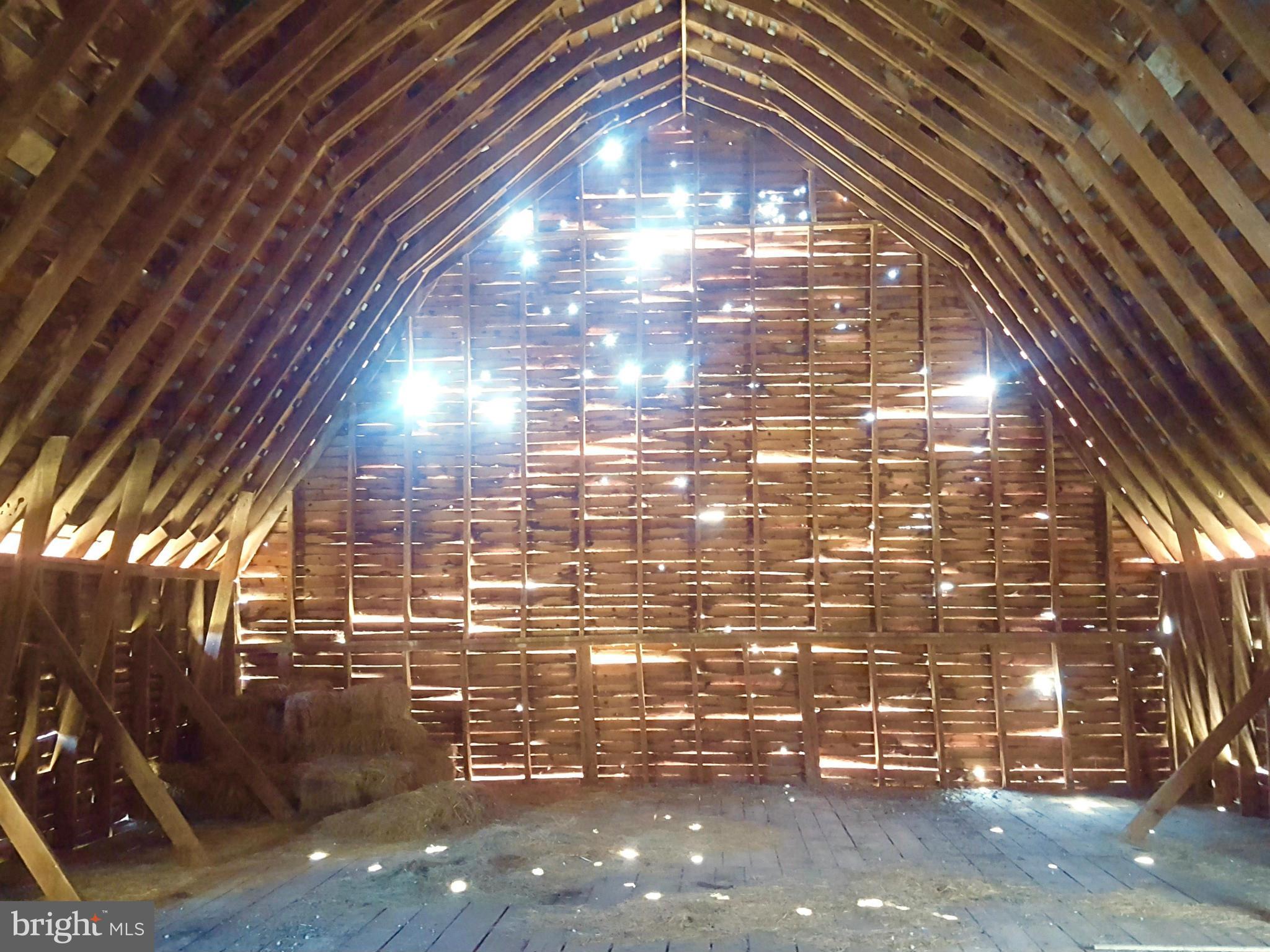 10383 Cliff Mills Road Marshall, VA 20115 - Photo 27 of 30 Soaring hayloft in main barn