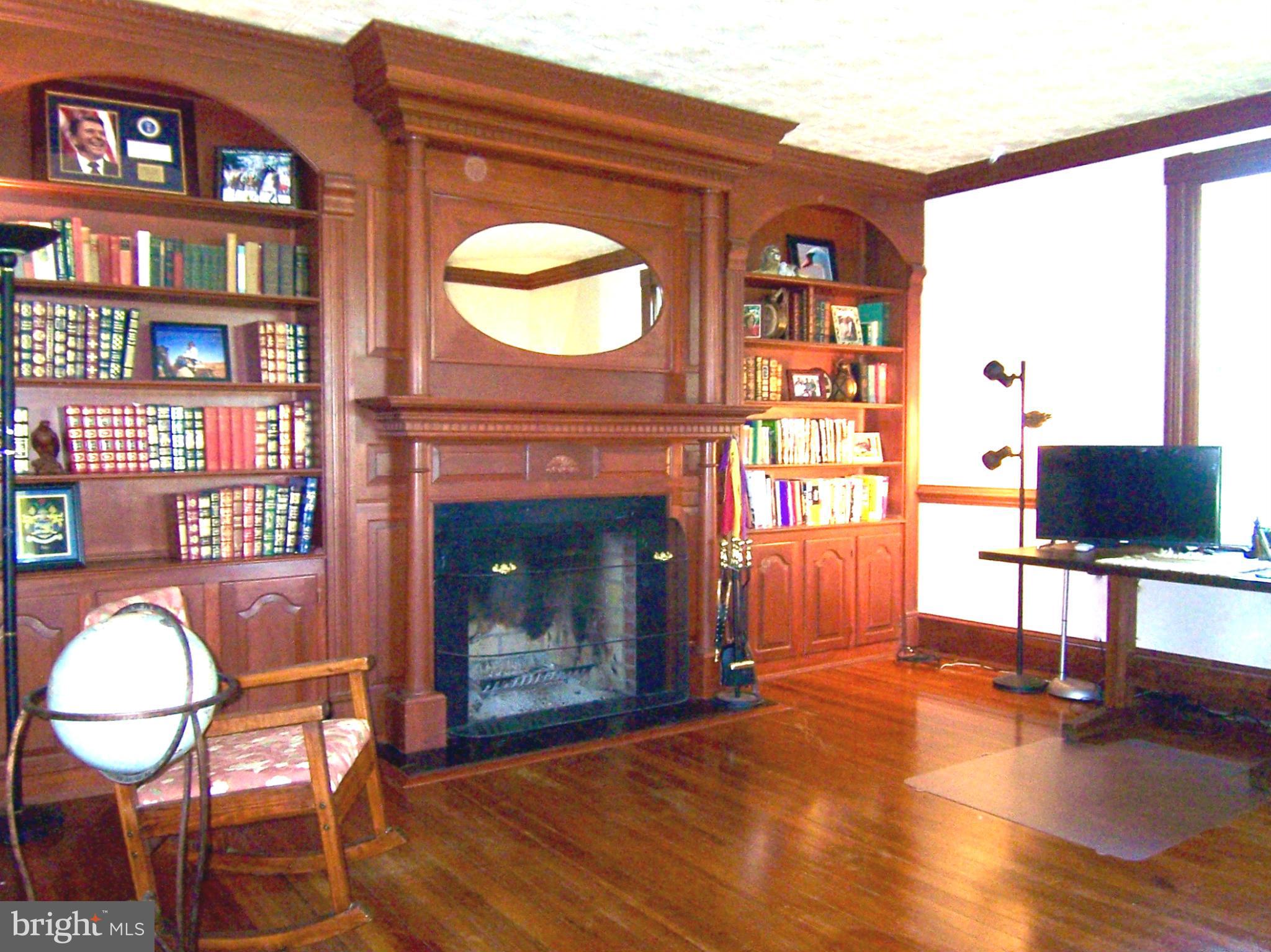 10383 Cliff Mills Road Marshall, VA 20115 - Photo 5 of 30 Living Room features built-in bookcases