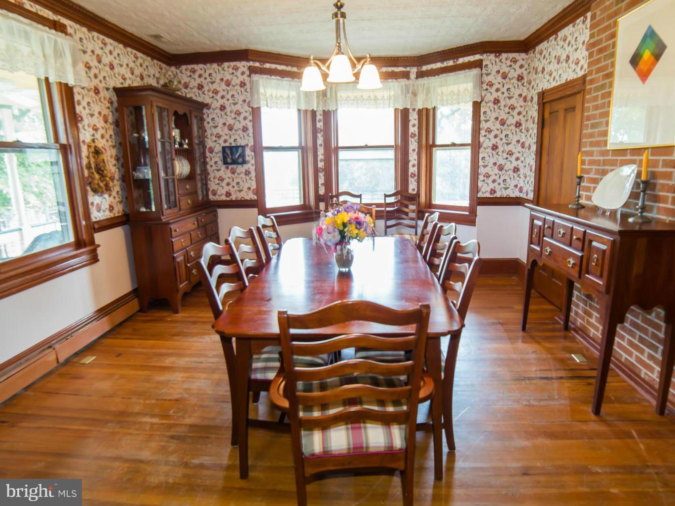 10383 Cliff Mills Road Marshall, VA 20115 - Photo 6 of 30 Spacious Dining Room with sunny bay windows