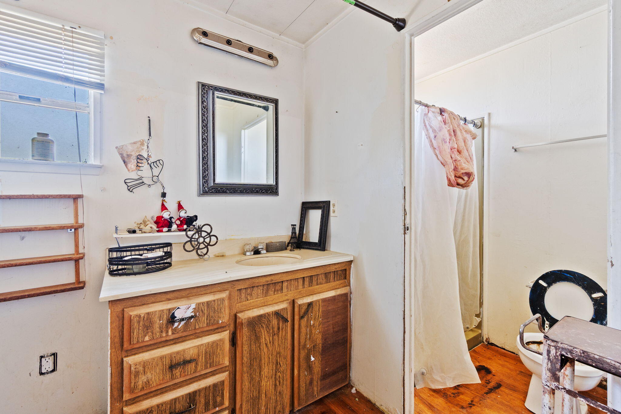 13957 Gas Point Road Igo, CA 96047 - Photo 10 of 18 a bathroom with a sink and a mirror