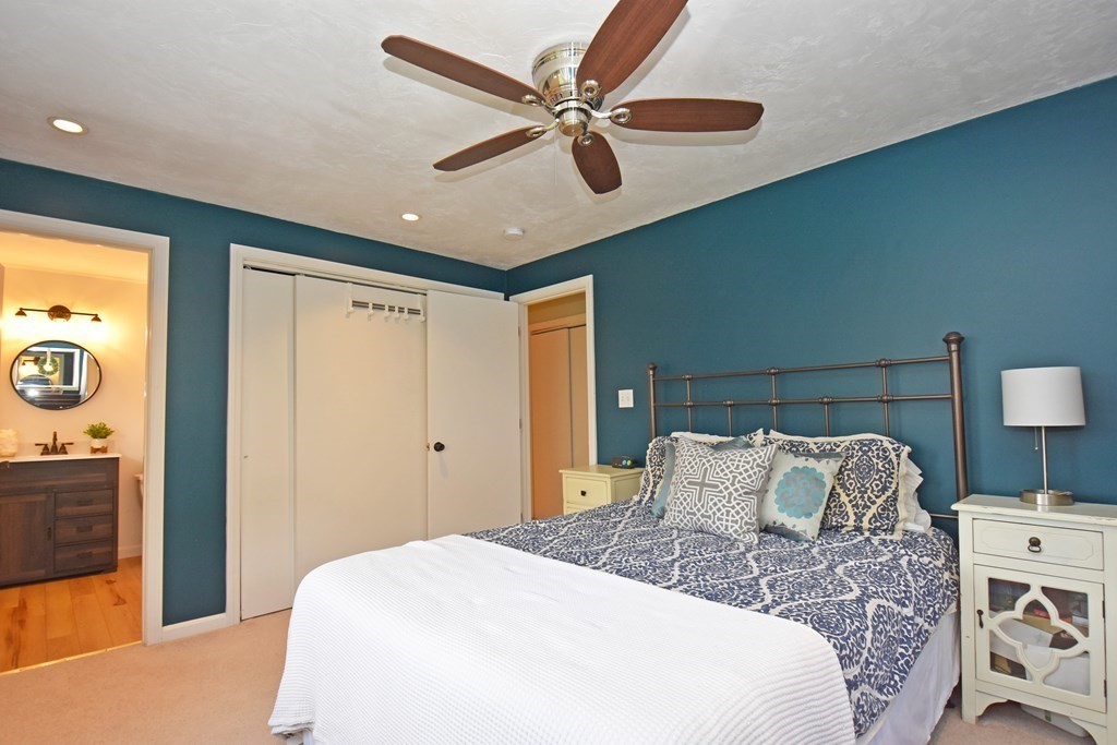 17 Ludlow Street Worcester, MA 01603 - Photo 11 of 23 a bedroom with a bed and a lamp