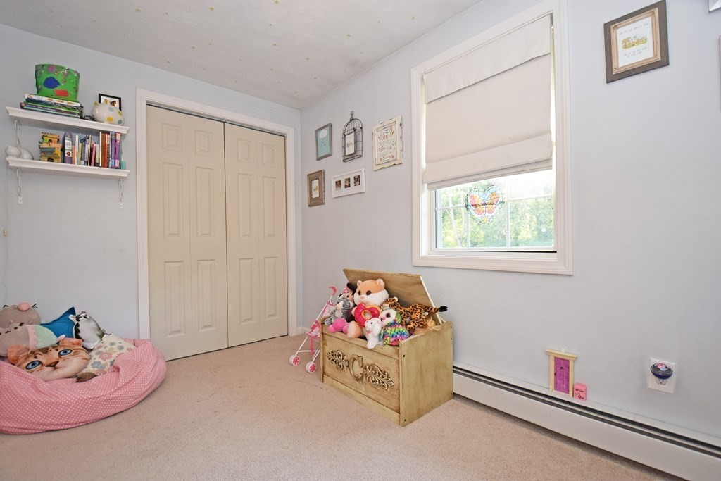 17 Ludlow Street Worcester, MA 01603 - Photo 14 of 23 a living room with furniture