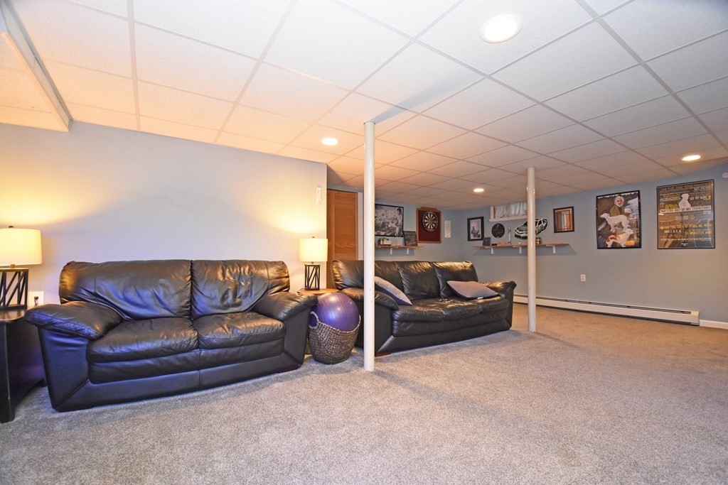 17 Ludlow Street Worcester, MA 01603 - Photo 16 of 23 a living room with furniture