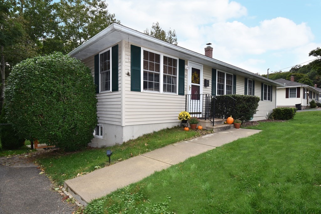 17 Ludlow Street Worcester, MA 01603 - Photo 19 of 23 a view of a house with backyard sitting area and garden