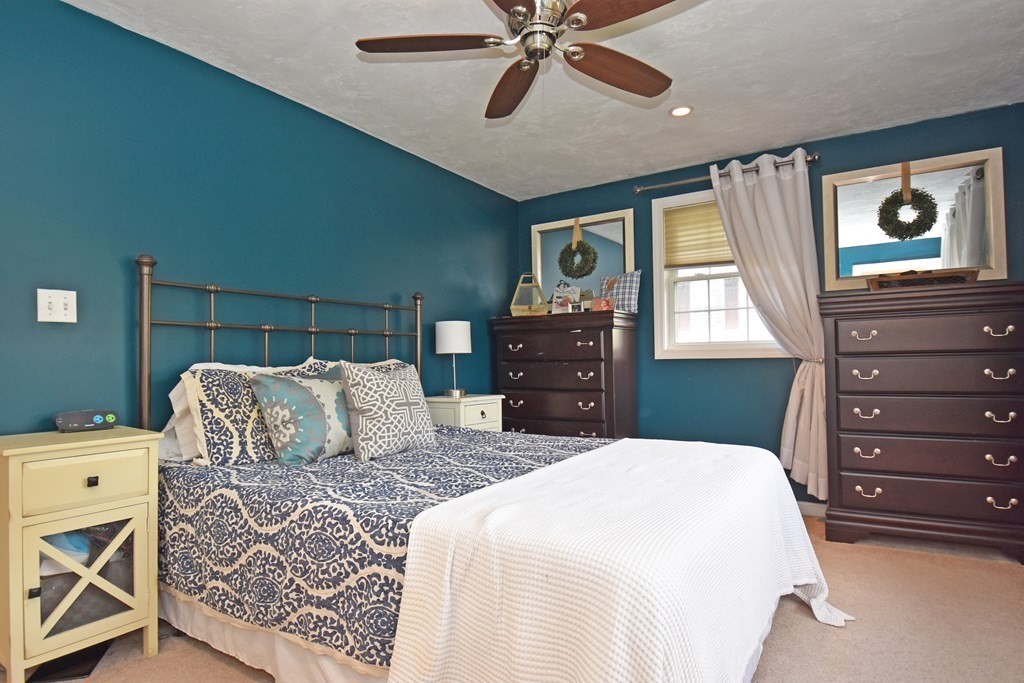 17 Ludlow Street Worcester, MA 01603 - Photo 10 of 23 a bedroom with a bed and a dresser