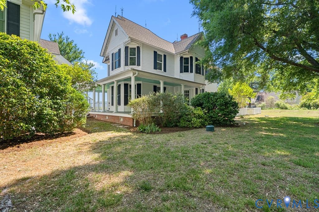 2414 Windmill Point Road White Stone, VA 22578 - Photo 58 of 72 a front view of a house with a yard