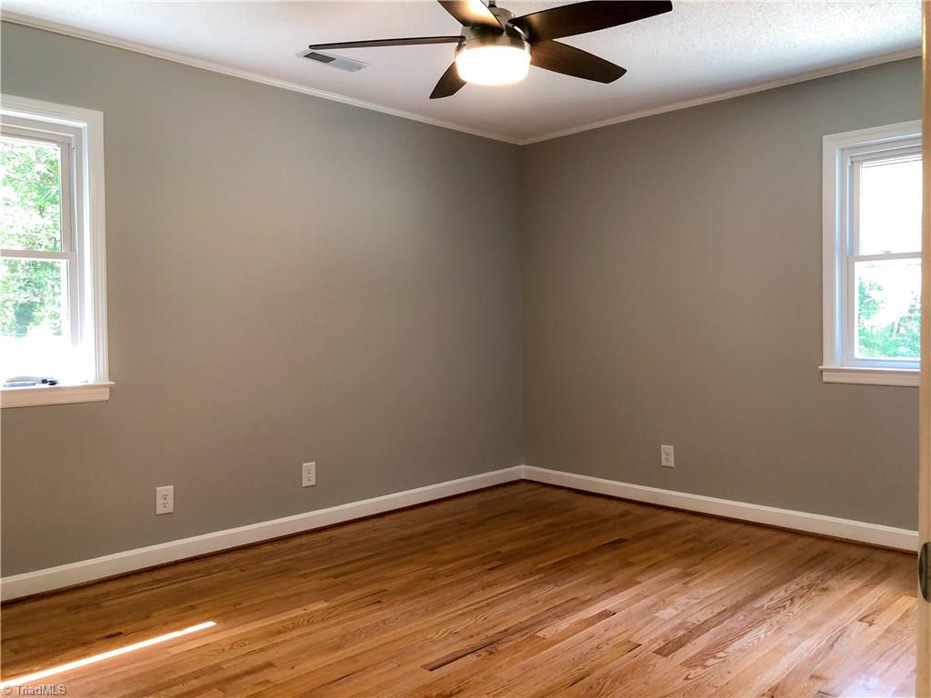328 Hartgrove Road King, NC 27021 - Photo 12 of 25 The master bedroom is bright and beautiful and is located on the upper level.