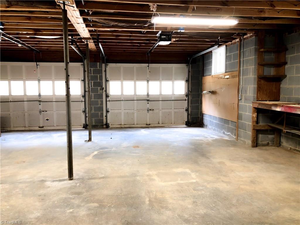 328 Hartgrove Road King, NC 27021 - Photo 23 of 25 2 Car Garage on the lower level has plenty of room for storage and work areas.