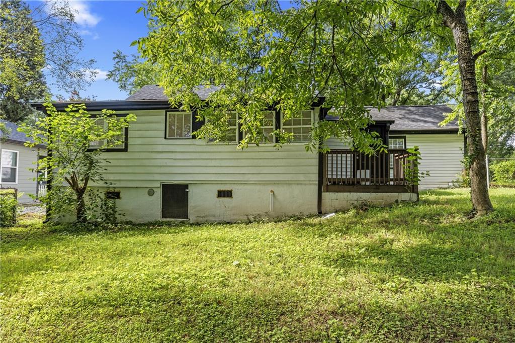 1339 Lyle Avenue Atlanta, GA 30344 - Photo 19 of 21 a front view of a house with a yard