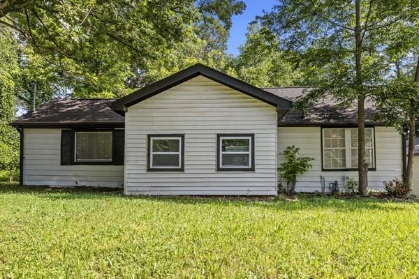 1339 Lyle Avenue Atlanta, GA 30344 - Photo 21 of 21 a front view of a house with garden
