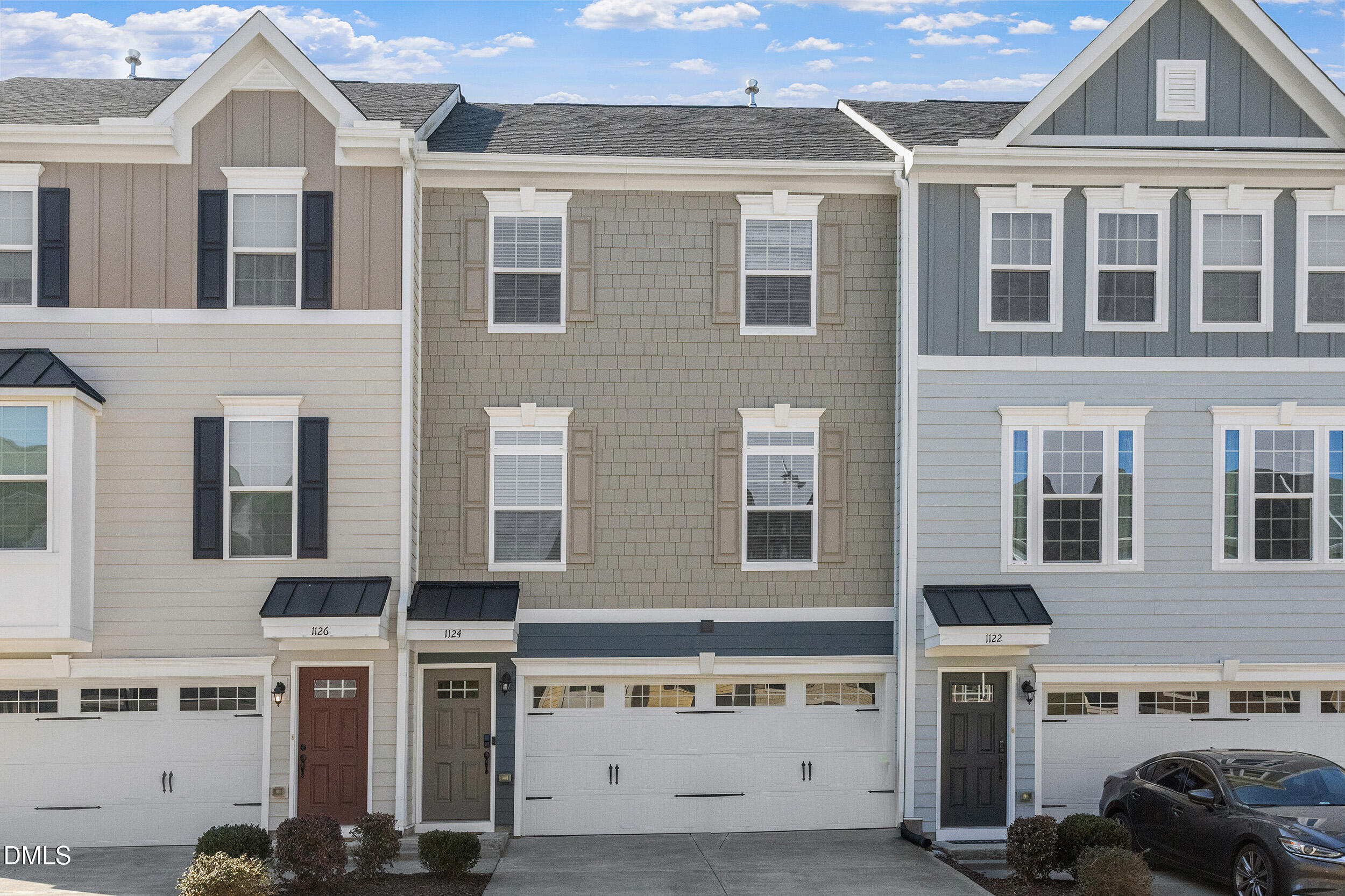 1124 Platform Drive Apex, NC 27502 - Photo 1 of 34 a view of a building with a lot of windows