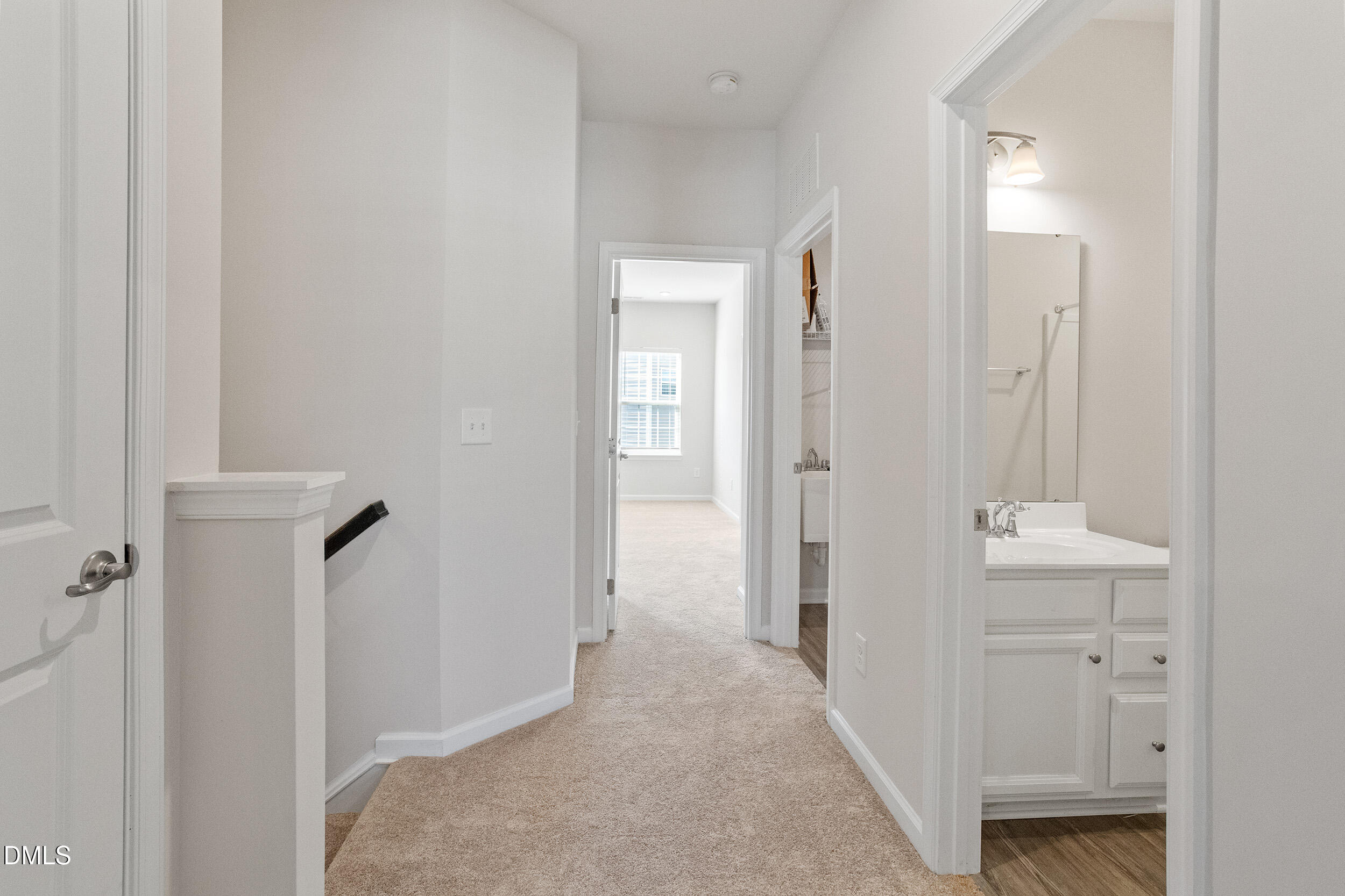 1124 Platform Drive Apex, NC 27502 - Photo 18 of 34 a view of a bathroom from a hallway