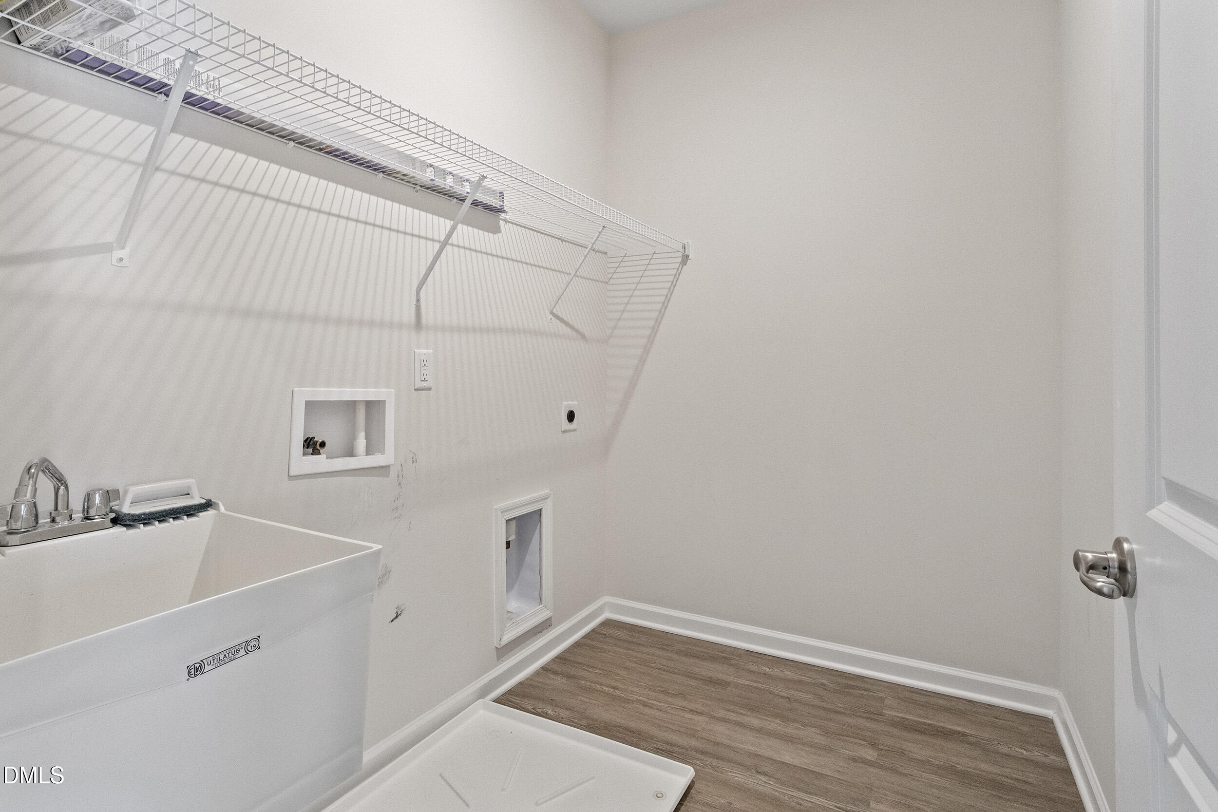1124 Platform Drive Apex, NC 27502 - Photo 20 of 34 a view of a room that has a sink and cabinets