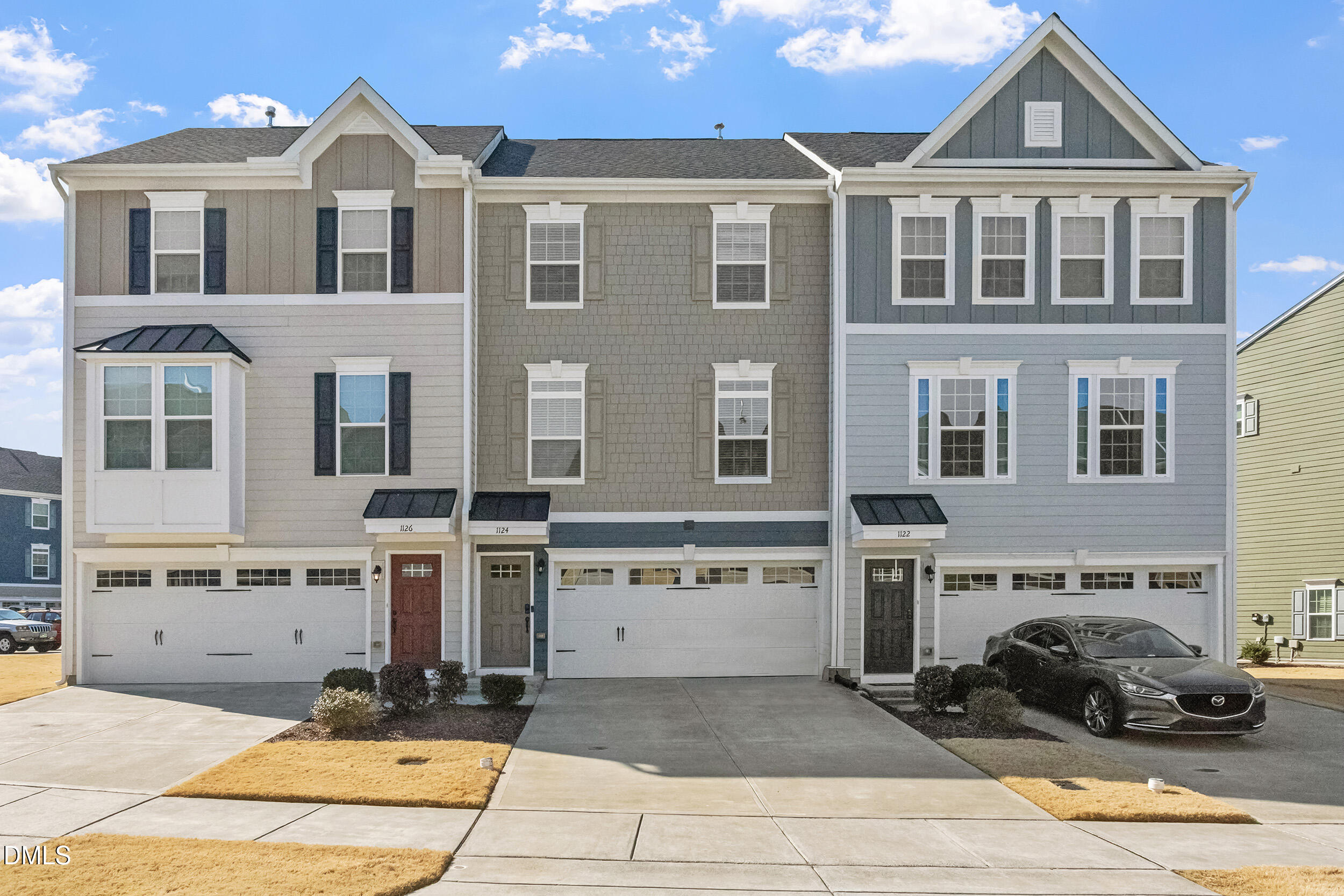 1124 Platform Drive Apex, NC 27502 - Photo 2 of 34 a front view of a building with parking space and parking space