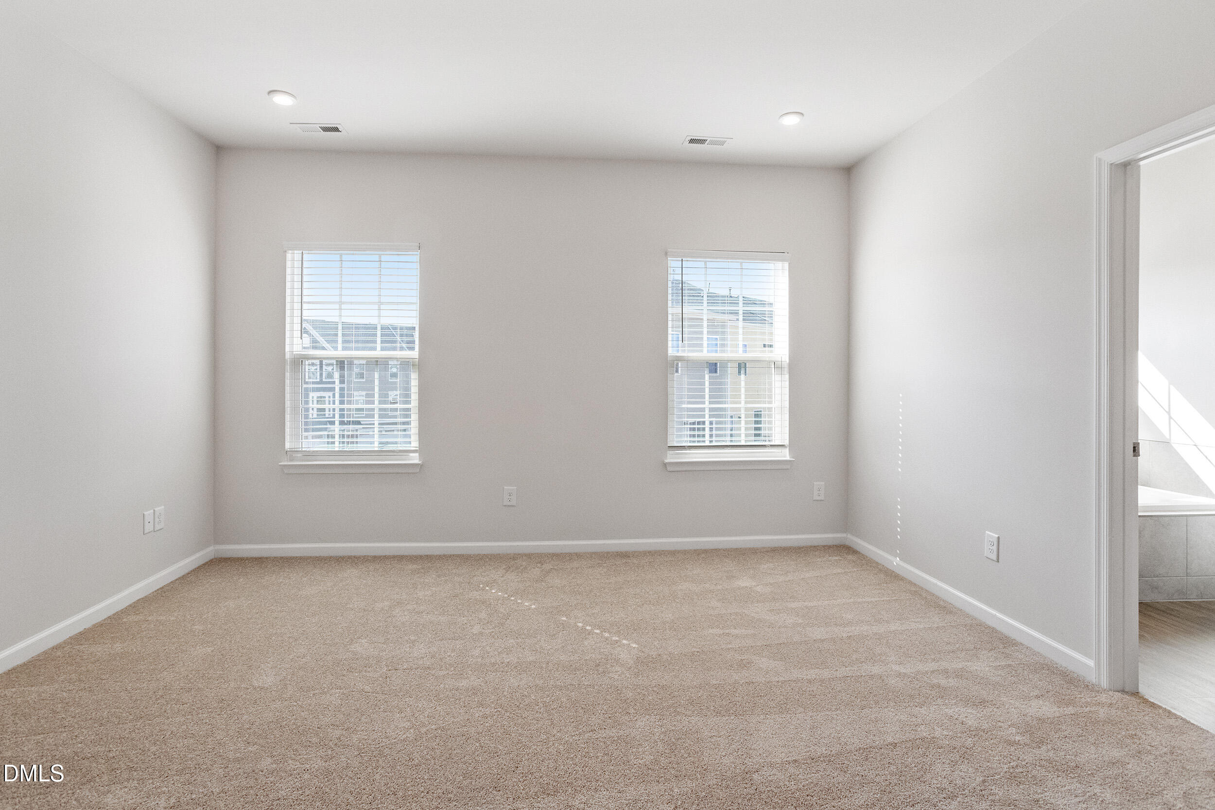 1124 Platform Drive Apex, NC 27502 - Photo 21 of 34 an empty room with windows