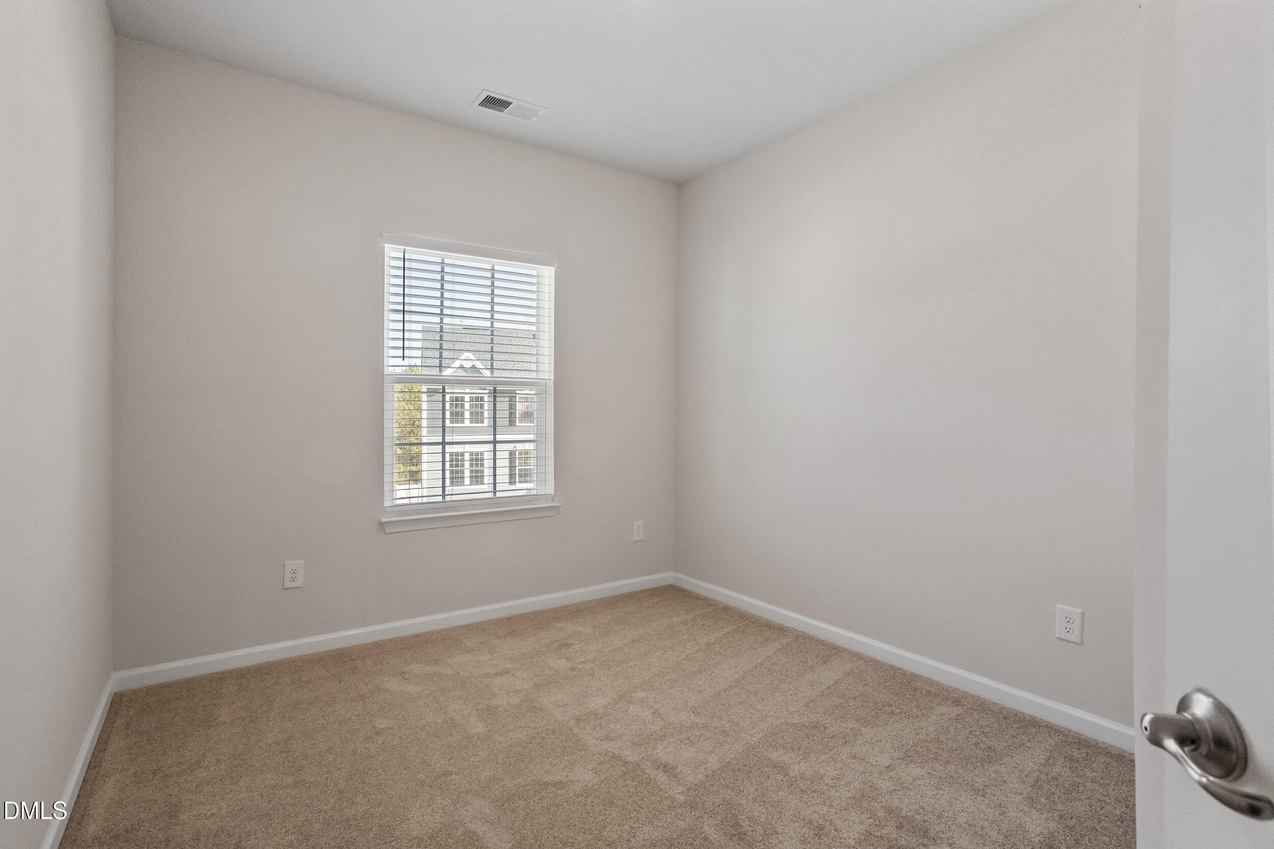 1124 Platform Drive Apex, NC 27502 - Photo 27 of 34 an empty room with a window