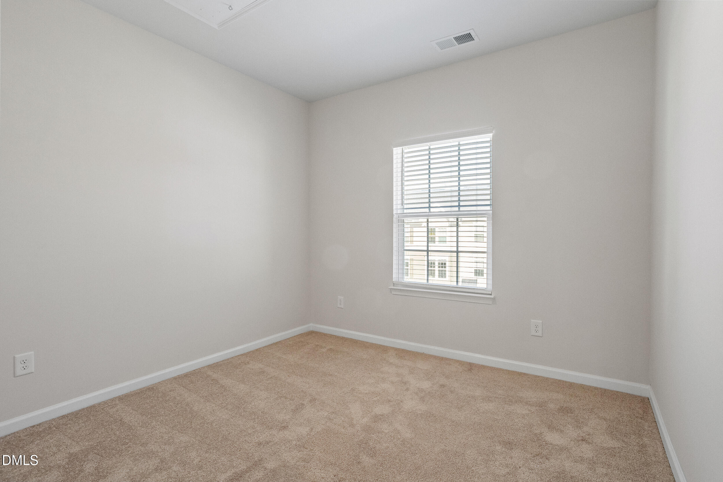 1124 Platform Drive Apex, NC 27502 - Photo 29 of 34 an empty room with a window