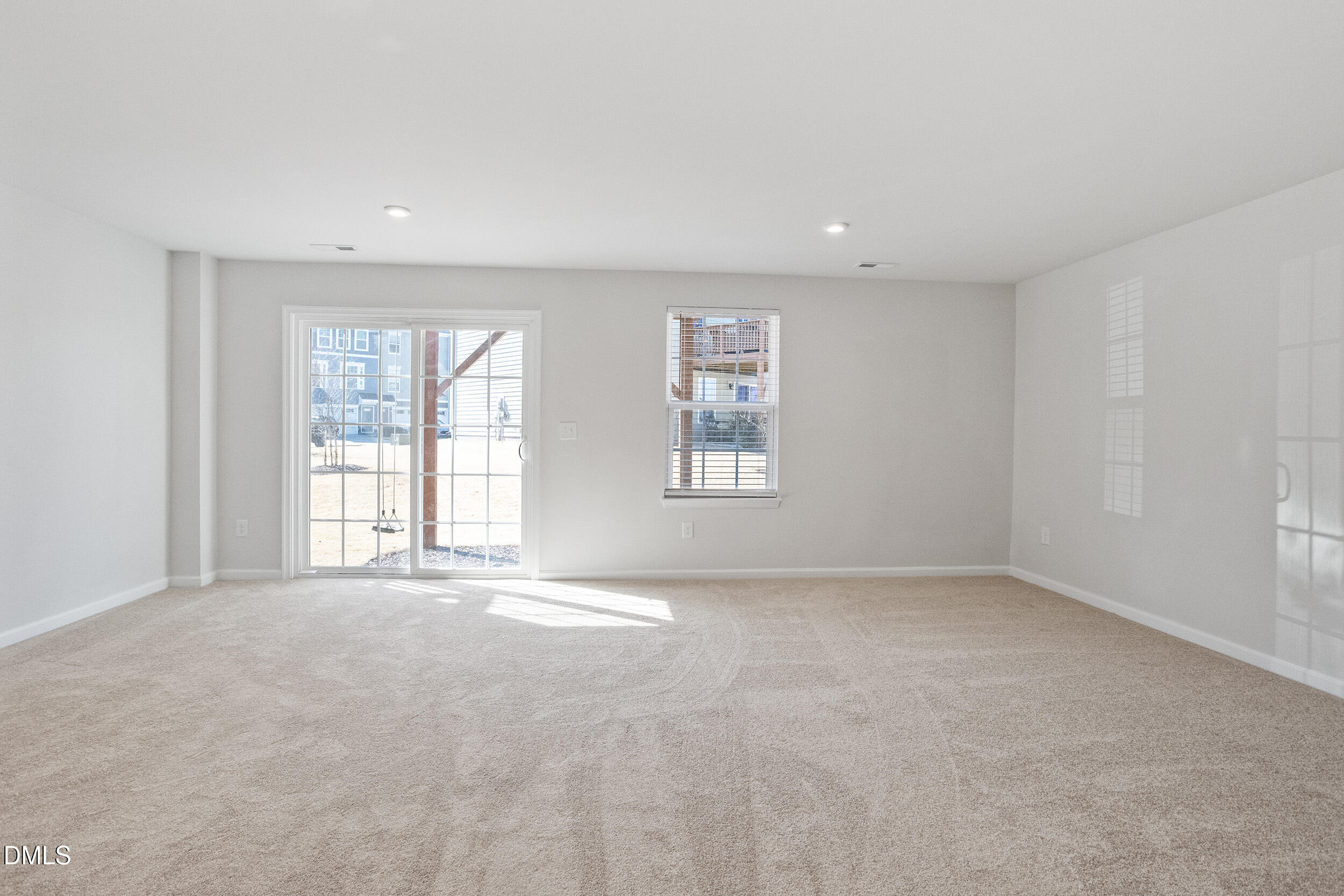 1124 Platform Drive Apex, NC 27502 - Photo 4 of 34 an empty room with windows
