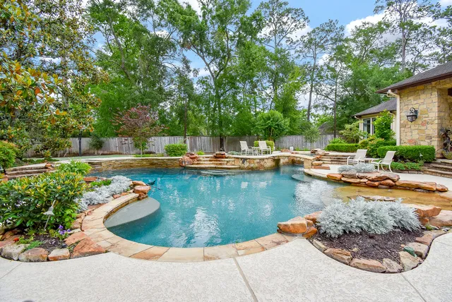 a view of a swimming pool with a sitting space