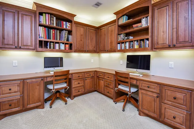 a view of a workspace with furniture