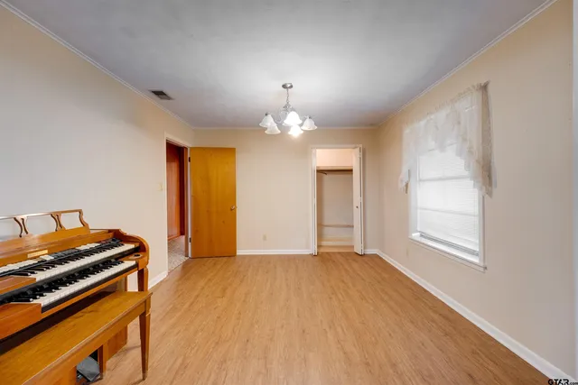 a view of a kitchen and window