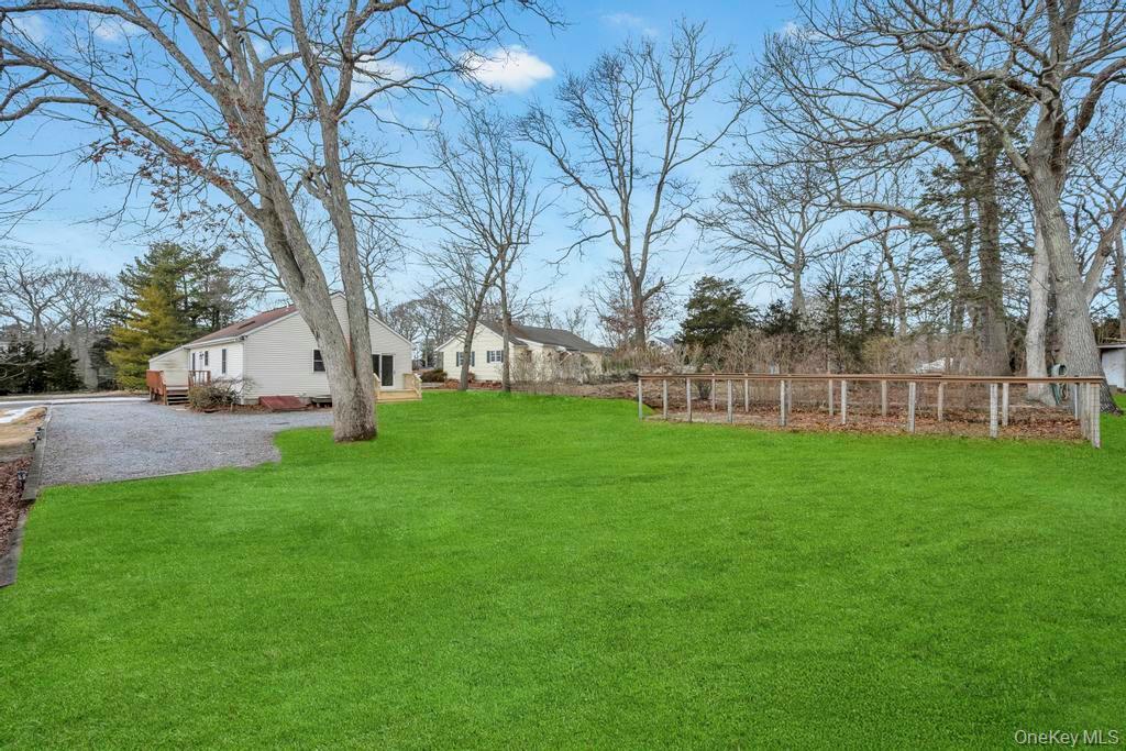 160 Oak Street Mattituck, NY 11952 - Photo 22 of 29 a view of a house with backyard