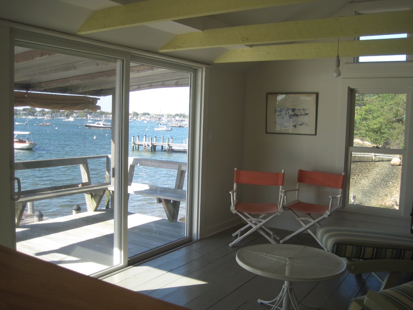 24 Calebs Pond Road Edgartown, MA 02539 - Photo 8 of 14 a room with furniture and a window