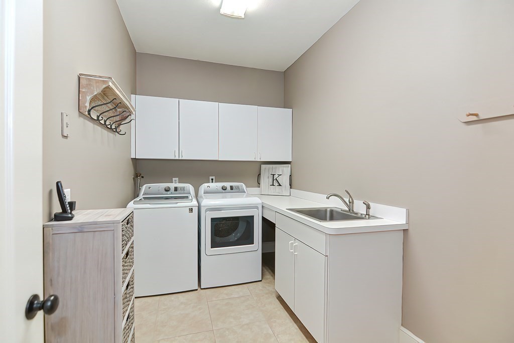 17 Elizabeth Road Hopkinton, MA 01748 - Photo 22 of 40 a utility room with dryer and washer