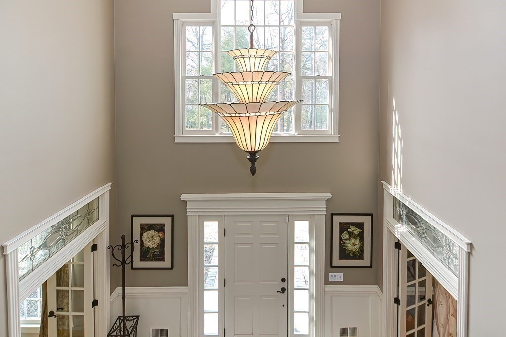 17 Elizabeth Road Hopkinton, MA 01748 - Photo 23 of 40 a front view of a house with wooden floor