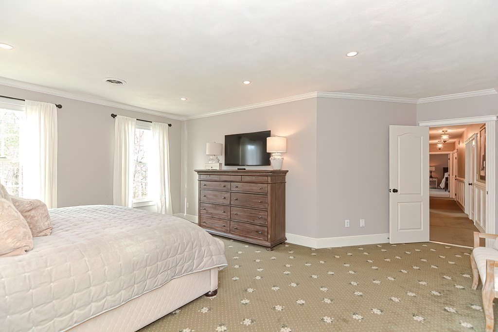 17 Elizabeth Road Hopkinton, MA 01748 - Photo 26 of 40 a bedroom with a bed and furniture