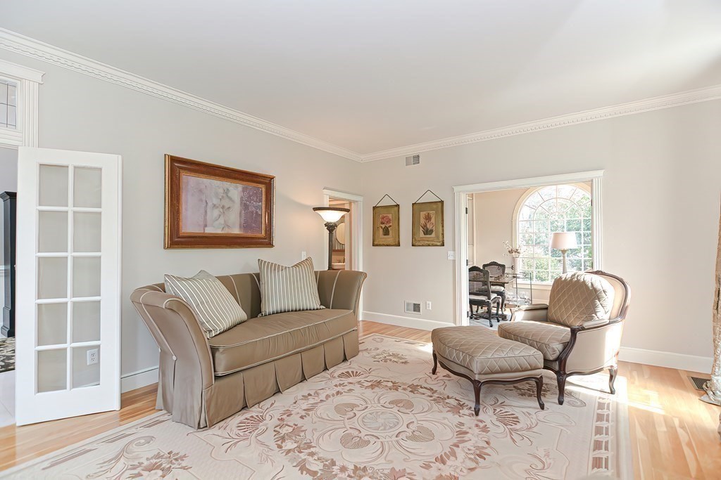 17 Elizabeth Road Hopkinton, MA 01748 - Photo 5 of 40 a living room with furniture wooden floor and a window