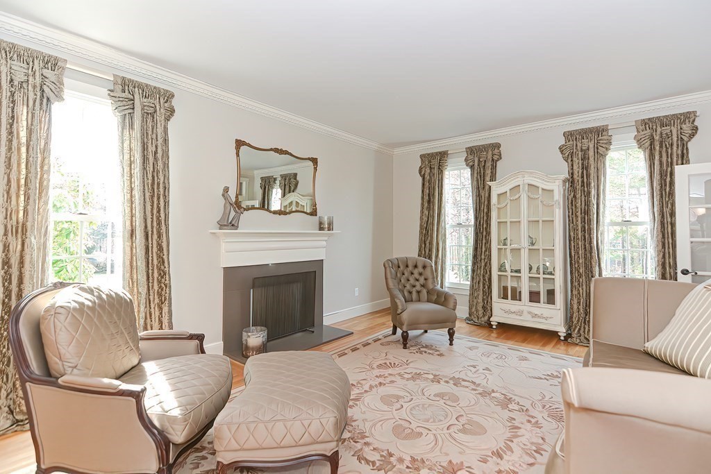17 Elizabeth Road Hopkinton, MA 01748 - Photo 6 of 40 a living room with furniture and a fireplace