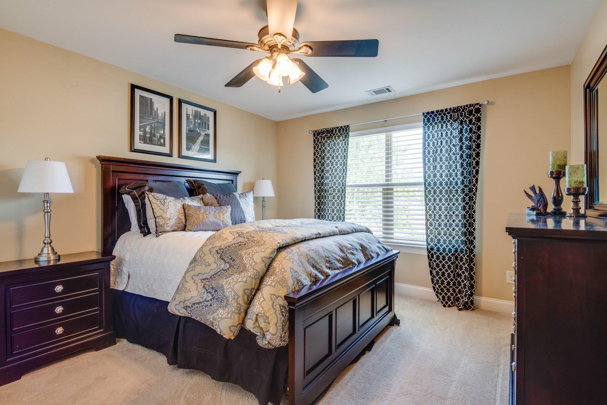 624 Streamside Lane Franklin, TN 37064 - Photo 20 of 33 a bed sitting in a bedroom next to a window