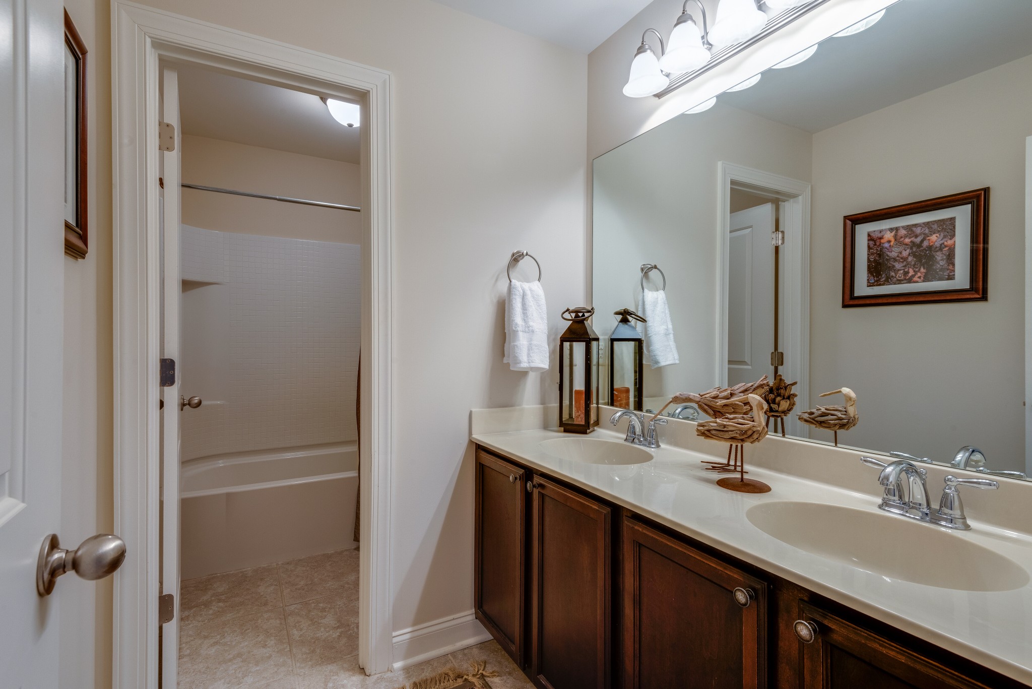 624 Streamside Lane Franklin, TN 37064 - Photo 23 of 33 a bathroom with a double vanity sink a and mirror