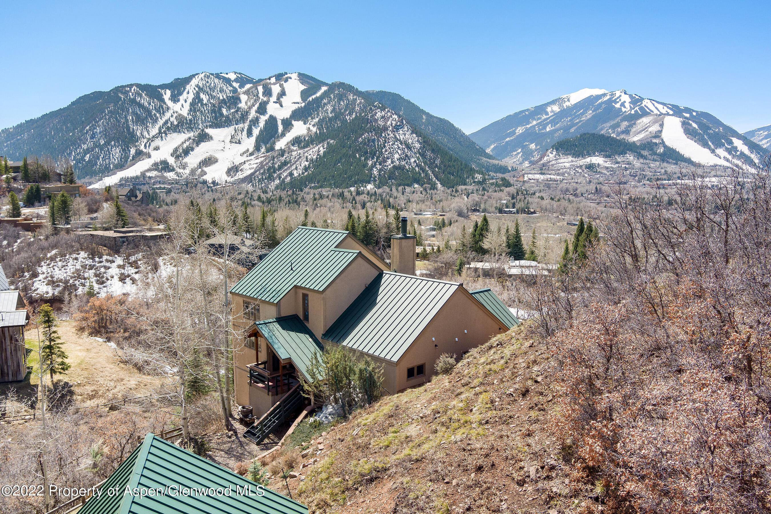 376 Draw Drive Aspen, CO 81612 - Photo 21 of 34 a view of a backyard with wooden floor