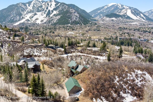 a view of a city with lots of trees