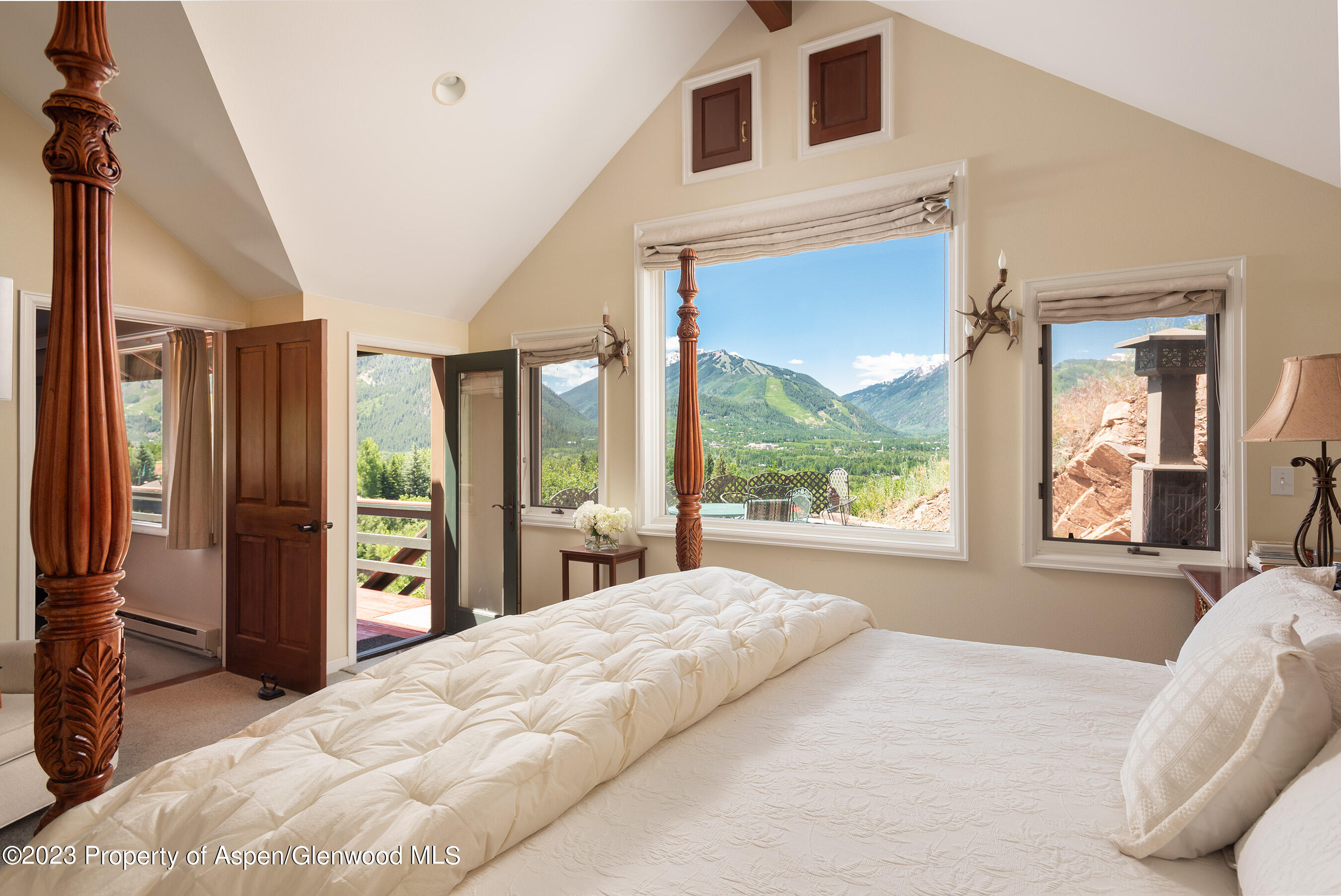 376 Draw Drive Aspen, CO 81612 - Photo 7 of 34 a bedroom with a large bed and a large window