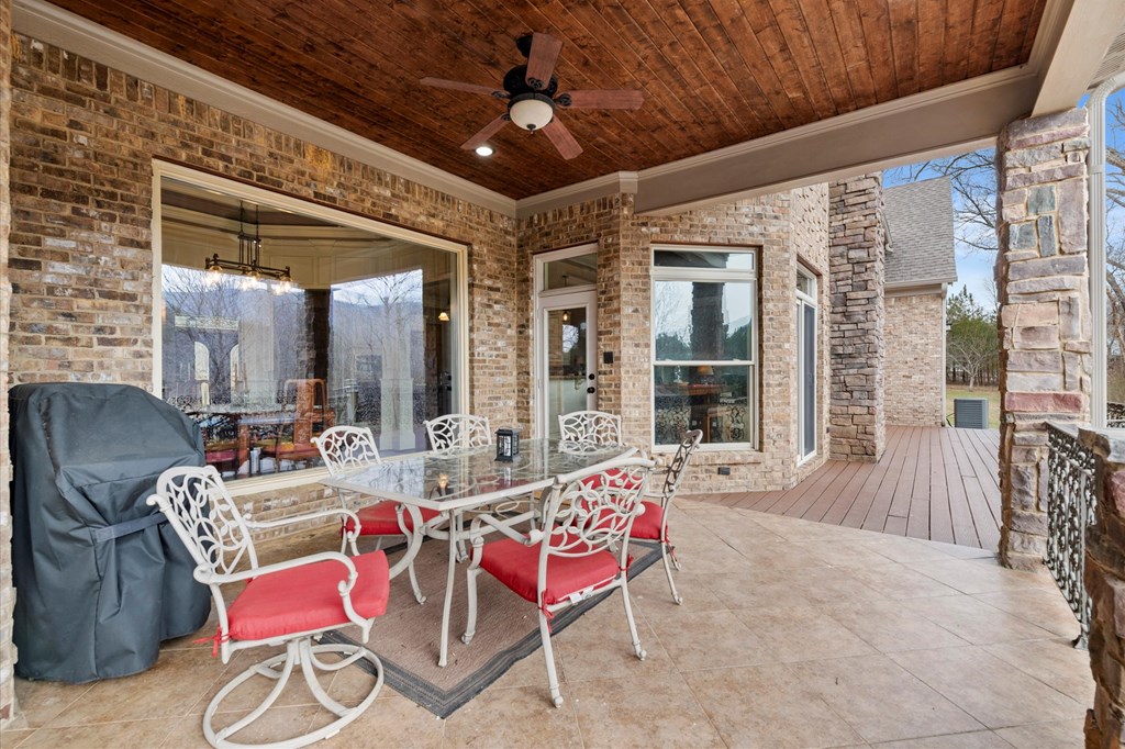 456 East Valley Road Northeast Rydal, GA 30171 - Photo 19 of 98 a outdoor space with patio the couches and a dining table with balcony view