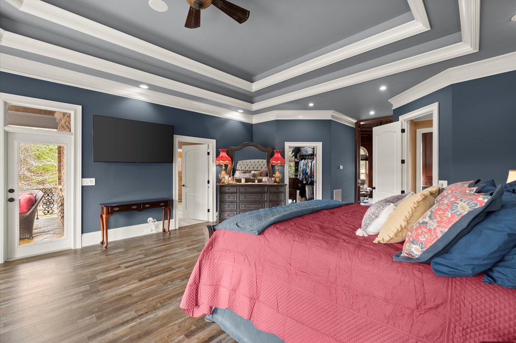 456 East Valley Road Northeast Rydal, GA 30171 - Photo 61 of 98 a bed room with a bed and a walk in closet