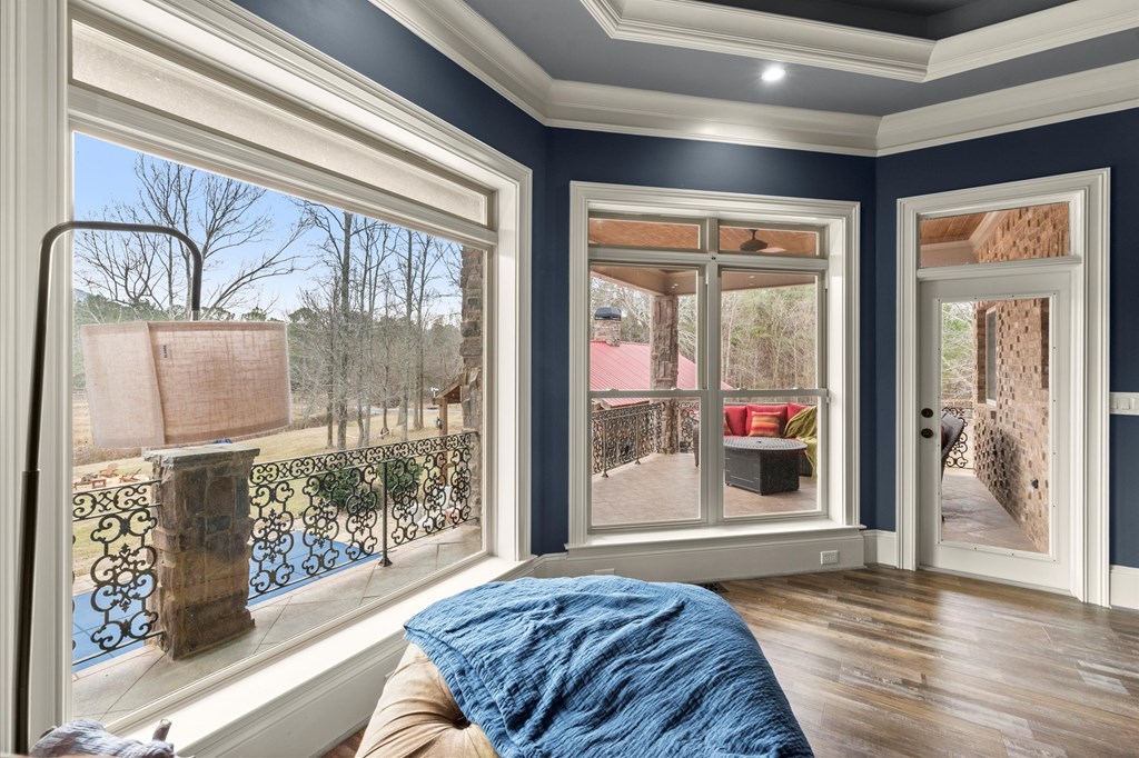 456 East Valley Road Northeast Rydal, GA 30171 - Photo 62 of 98 a living room with a large window and a rug