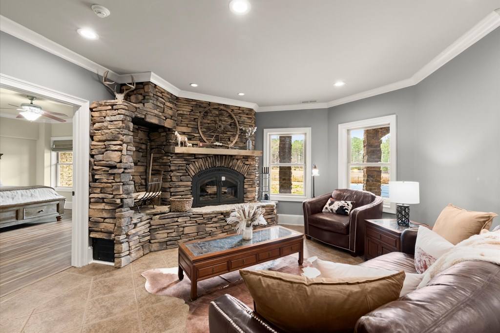456 East Valley Road Northeast Rydal, GA 30171 - Photo 76 of 98 a living room with furniture and a fireplace