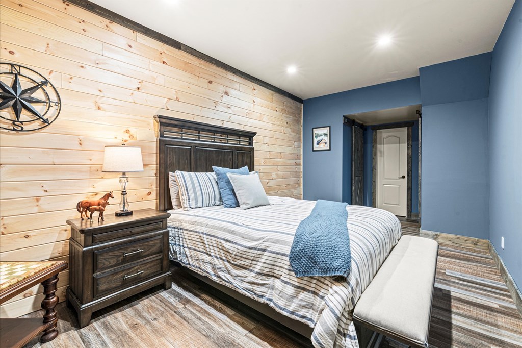 456 East Valley Road Northeast Rydal, GA 30171 - Photo 82 of 98 a bedroom with a bed and a dresser