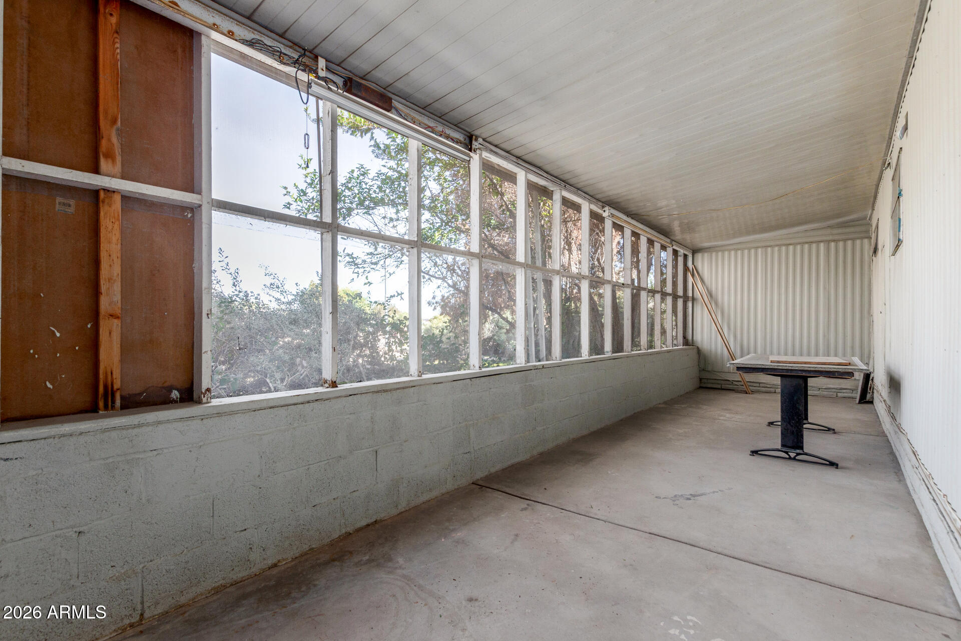 6633 West Nancy Road Glendale, AZ 85306 - Photo 19 of 29 a view of an empty room with a window