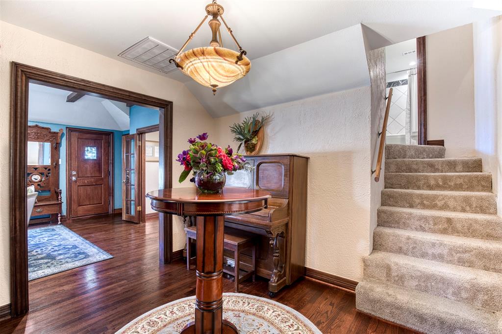 5123 Milam Street Dallas, TX 75206 - Photo 31 of 40 a view of entryway dining room and hall with wooden floor