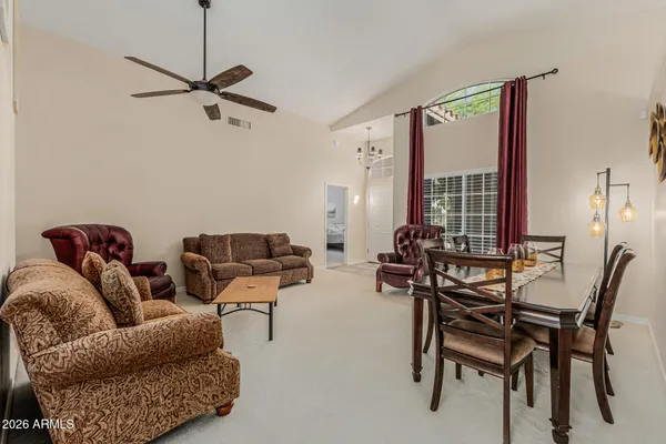 a living room with furniture and a window