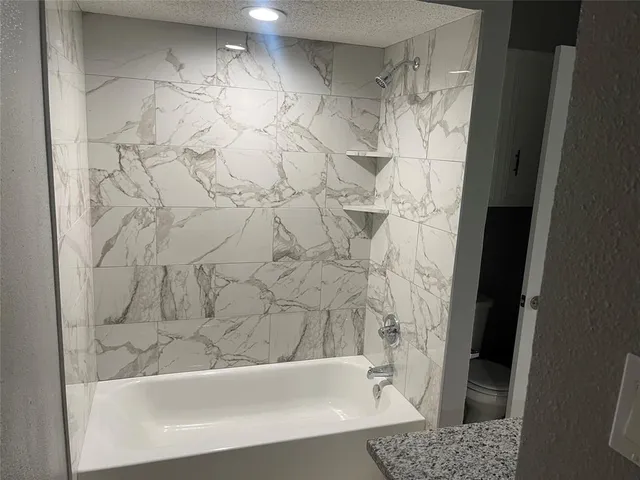 a bathroom with a bathtub